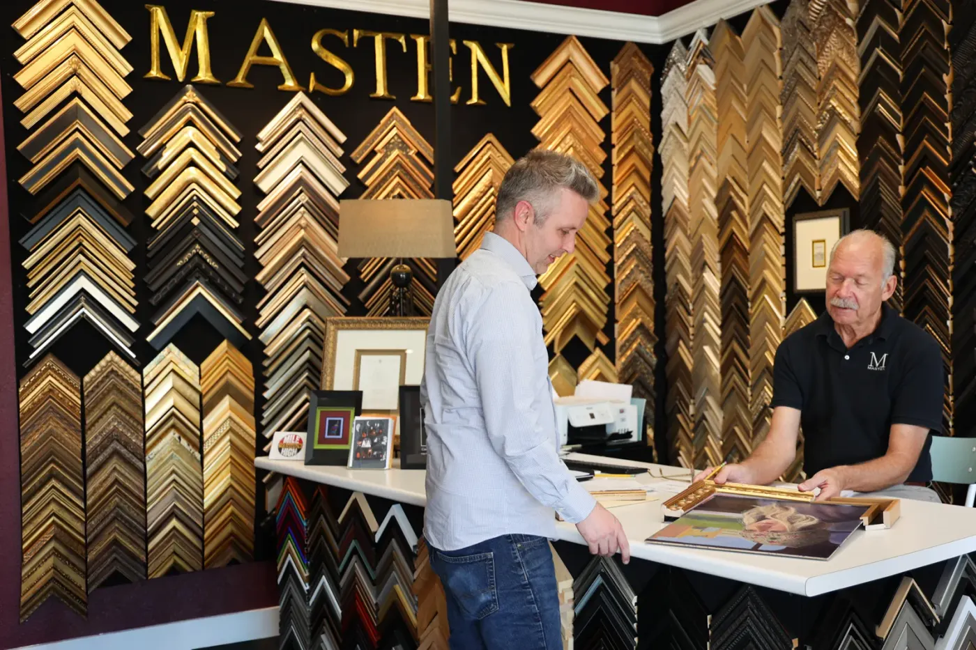 A real Masten Fine Framing consultation in the Greenwood Village studio